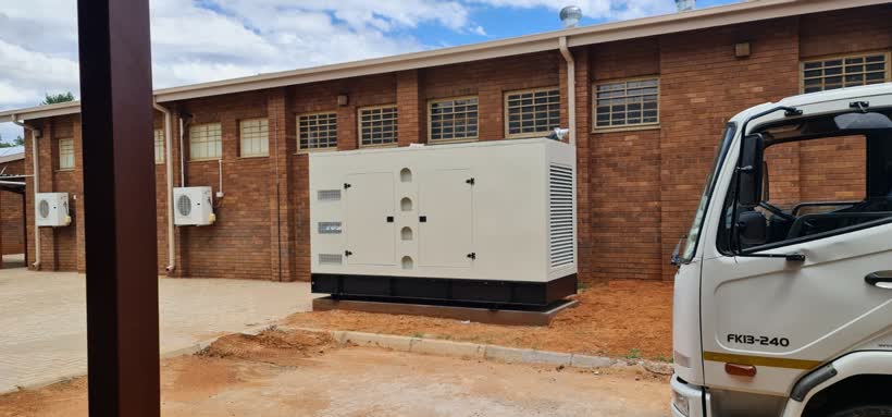 Commercial standby generator installed at a building